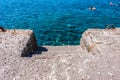 Step to access the crystalline sea water of the island of Santorini in Greece Royalty Free Stock Photo