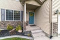 Concrete steps leading to a front door Royalty Free Stock Photo