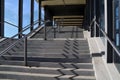 Concrete steps leading to pedestrian bridge in a city