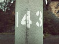 Concrete stone with 143`  numbers  on it` Royalty Free Stock Photo