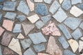 Concrete surface with multiple patches of large colored stones Royalty Free Stock Photo