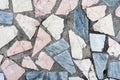 Concrete surface with multiple patches of large colored stones Royalty Free Stock Photo