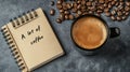 A concrete surface supports a warm cup of coffee, a blank notebook, and a pen, all gently lit by the soft morning light Royalty Free Stock Photo