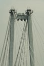 Concrete suspension bridge supports with multiple ropes. Royalty Free Stock Photo