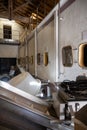 Concrete tanks for first fermentation of grapes, Bordeaux Saint-Emilion wine making region picking, sorting with hands and