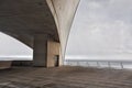 Concrete terrace with misterious industrial Atlantic Ocean view