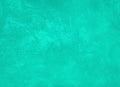 Concrete texture toned in the trendy color Aqua Menthe. Stucco wall background