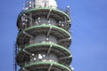 Concrete tower with several antenna installations for mobile communication, tv and radio in the Waalhaven