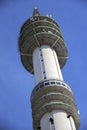 Concrete tower with several antenna installations for mobile communication, tv and radio in the Waalhaven