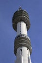 Concrete tower with several antenna installations for mobile communication, tv and radio in the Waalhaven