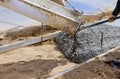 Concrete truck with pouring cement during to residential street Royalty Free Stock Photo