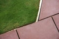 Concrete walk pathway and green grass