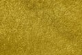 Concrete wall airbrushed with glossy golden paint Royalty Free Stock Photo