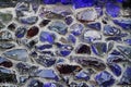 Concrete wall with broken glass elements Royalty Free Stock Photo