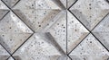 Concrete wall design featuring geometric triangular patterns in urban architecture Royalty Free Stock Photo