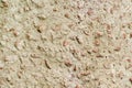 Concrete wall with granite pebbles. Royalty Free Stock Photo