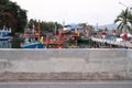 Concrete wall. Local fisherman port, fisherman boat mooring. Fisherman village near Pattaya beach, Thailand. South East Royalty Free Stock Photo