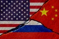 Wall with painted united states, china and russia flags Royalty Free Stock Photo