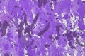 Concrete wall with random spots of purple paint Royalty Free Stock Photo