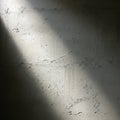Concrete wall with a rough texture illuminated by diagonal sunlight. The surface Royalty Free Stock Photo