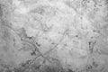 Concrete wall with scuffs and cracks of gray color. Gray background with cement texture Royalty Free Stock Photo