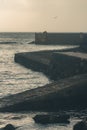 A concrete wall in a small fishing port Royalty Free Stock Photo