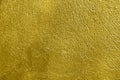 Concrete wall sprayed with golden color paint Royalty Free Stock Photo
