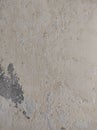 Old white paint texture peeling off concrete wall.Grunge Background Texture, Abstract Dirty Splash Painted Wall. Royalty Free Stock Photo