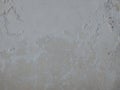 Old white paint texture peeling off concrete wall.Grunge Background Texture, Abstract Dirty Splash Painted Wall. Royalty Free Stock Photo