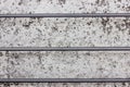 Concrete wall with three gorizontal steel rods Royalty Free Stock Photo