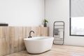 Concrete and wooden luxury bathroom interior with bright window and city view, various objects. Hotel and luxury home concept. 3D