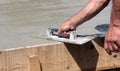 Concreting the floor of a new house,pouring concrete from cart Royalty Free Stock Photo