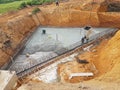 Concreting work by construction workers at the construction site.