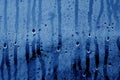 Condensation drops close up in navy blue tone. Royalty Free Stock Photo