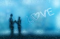 Condensation on glass forming a love word