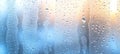 Condensation on Glass, Water Droplets on Window, Raindrop Texture on Blurred Background Royalty Free Stock Photo