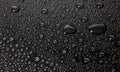 Condensation water drops on black glass background. Rain droplets with on dark surface. Abstract wet texture Royalty Free Stock Photo