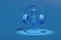 Condenser microphone, headphones isolated on a blue background. Podcast concept. 3d illustration Royalty Free Stock Photo