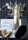 Condenser microphone in vocal recording room Royalty Free Stock Photo