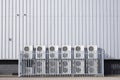 Condensers external units in row stack for refrigerant gas for air conditioning system Royalty Free Stock Photo