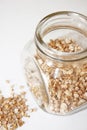 Condiment. Dried parsley root. Spices loose and in a glass jar Royalty Free Stock Photo