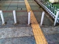 the condition of the sidewalk with decorative plants and flowers Royalty Free Stock Photo