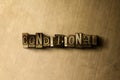 CONDITIONAL - close-up of grungy vintage typeset word on metal backdrop Royalty Free Stock Photo