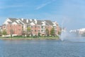 Condo apartment homes overlooking community lake in America Royalty Free Stock Photo