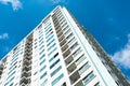 Image of condo building and blue sky background. Royalty Free Stock Photo