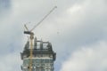 Condo building site with cranes and blue sky Royalty Free Stock Photo