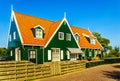 Condo comples build inraditional Marken Style green boarded wall and red tile roof Royalty Free Stock Photo