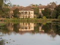 Condo Refecting on the Pond Royalty Free Stock Photo