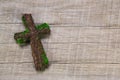 Condolence: wooden handmade cross on a background.