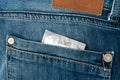 Condom in a back pocket Royalty Free Stock Photo